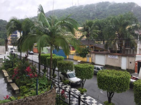  Apartamento Guarujá Enseada  Гуаружа